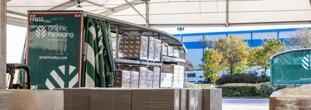 Green truck in aganto temporary loading bay