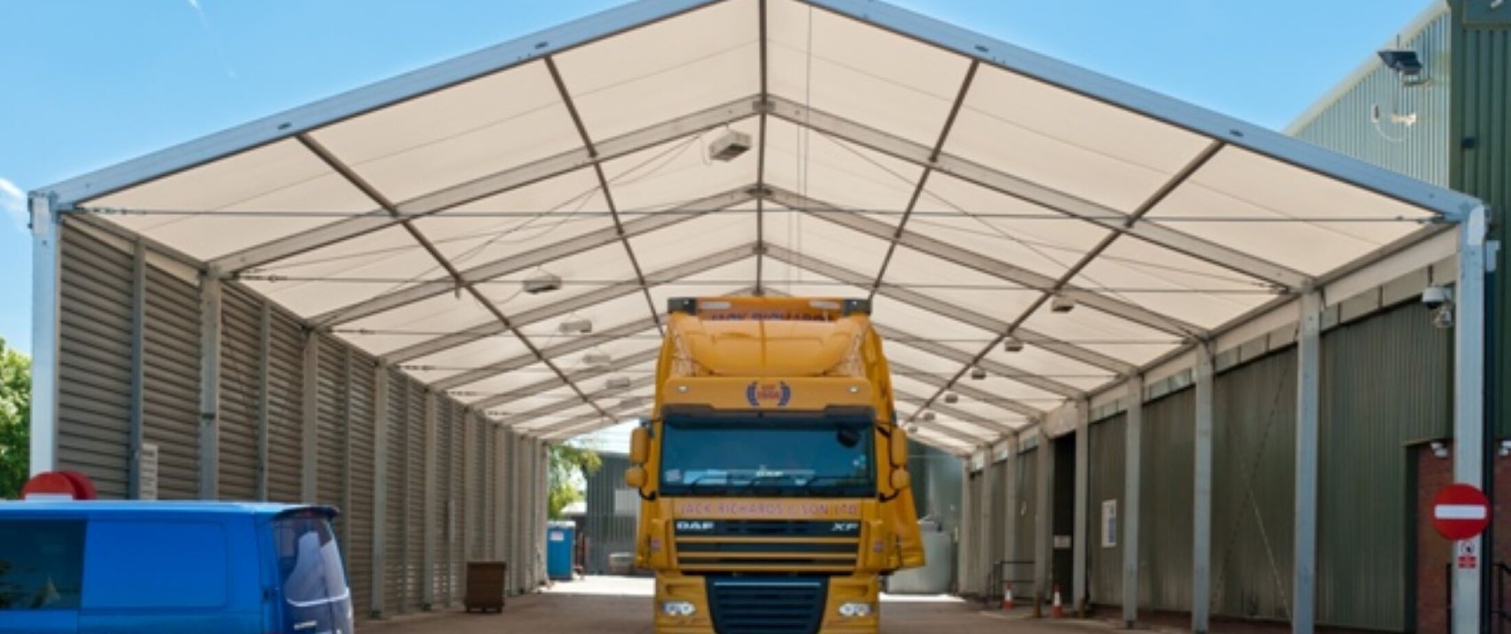 Temporary loading bay with yellow truck