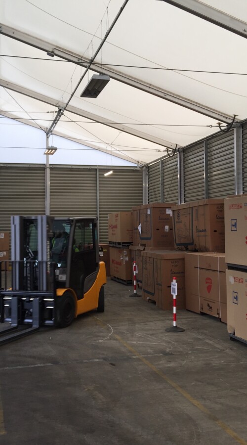 Forklift-in-warehouse-used-for-storing-boxes
