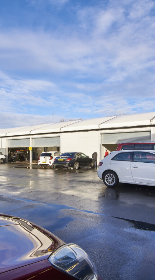 aganto-temporary-building-used-as-a-vehicle-workshop