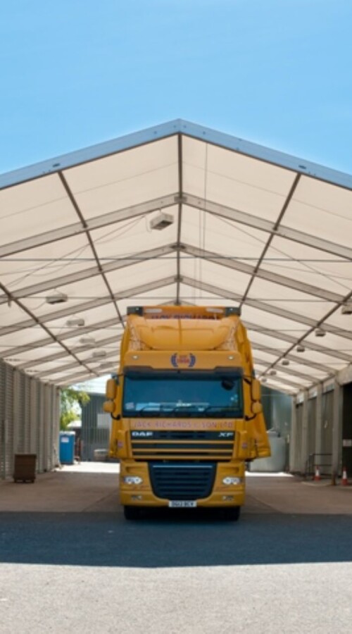 Temporary loading bay with yellow truck