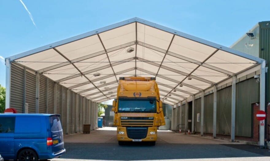 Temporary loading bay with yellow truck