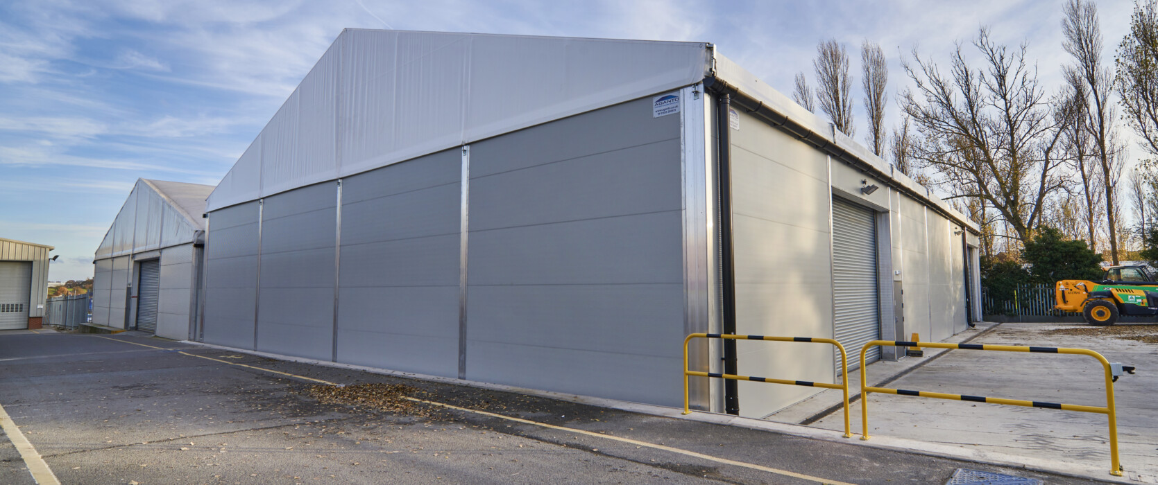 fully insulated temporary structure to accommodate warehouse storage and vehicle workshop