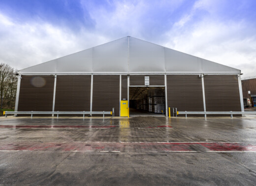 temporary building installed with a rapid action roller shutter door