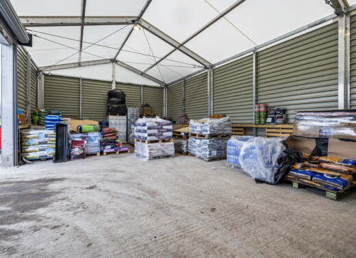 additional temporary storage space to house  animal feed products